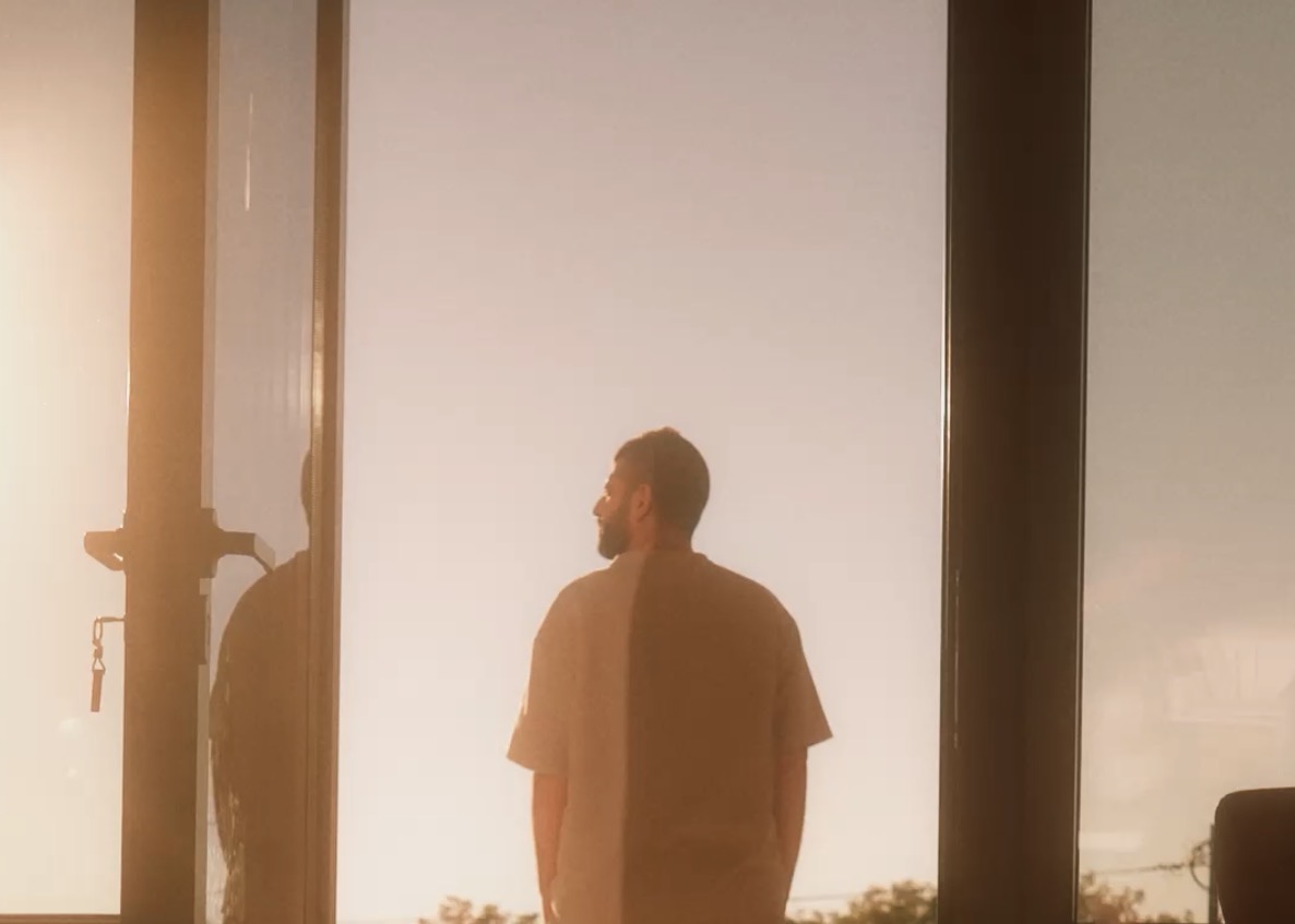 Dor Sasson standing in warm sunset light